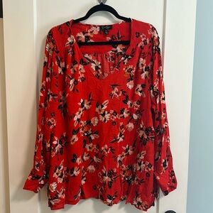 Red floral blouse
